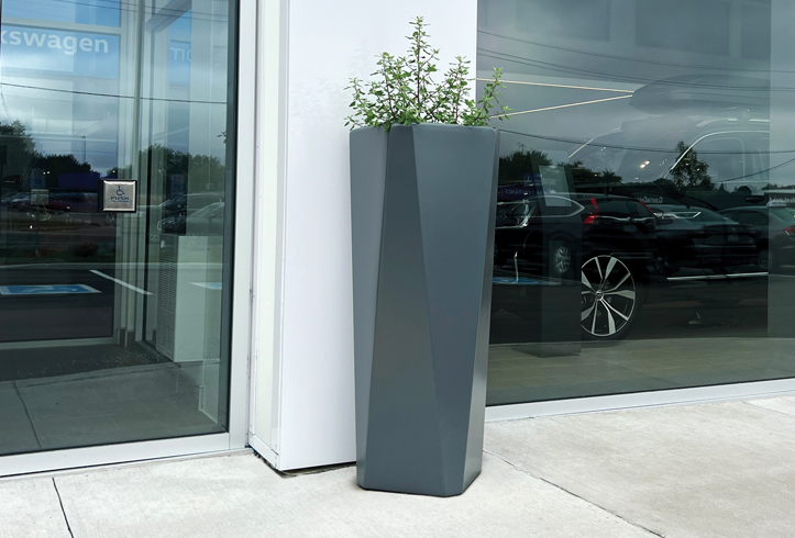 Old Town Fiberglass Crystal geometric planter at the entrance to Crosby Volkswagen Kitchener.