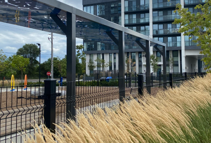 Omega Architectural fence system installed around a dog off-leash area at Zorra Park in Toronto.