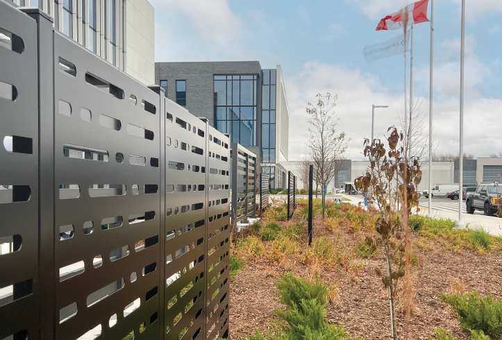 Omega Unik Perforated Privacy Fence System at the Cooperators head office in Guelph.