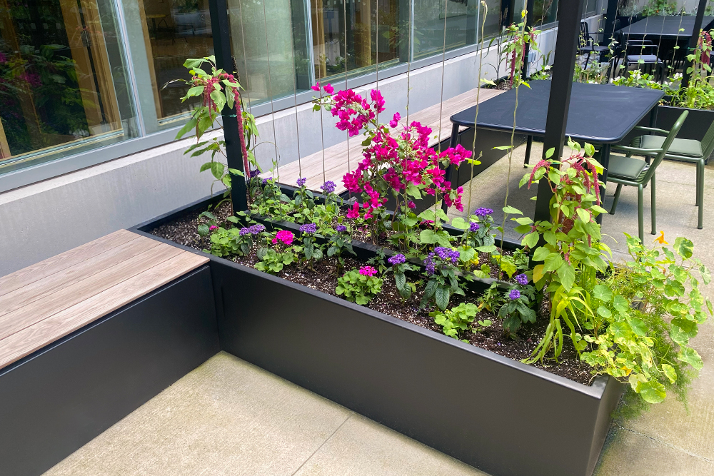 Join modular planters with integrated seating.