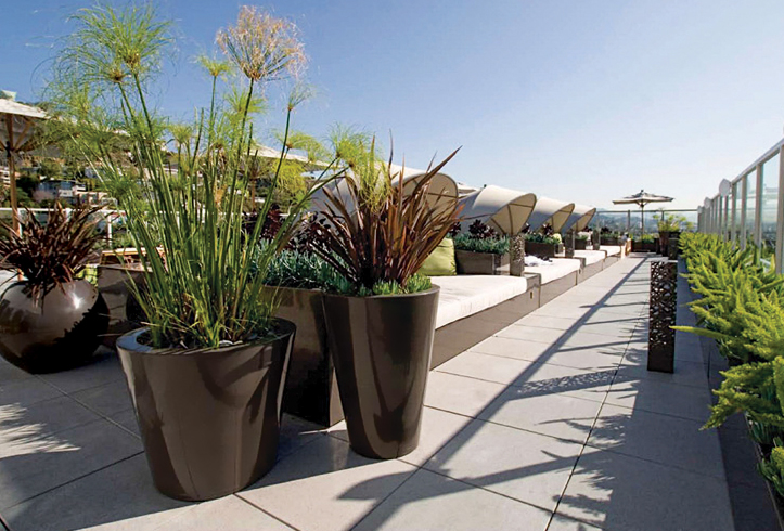 Old Town Fiberglass Ponto Planters on a hotel rooftop patio.