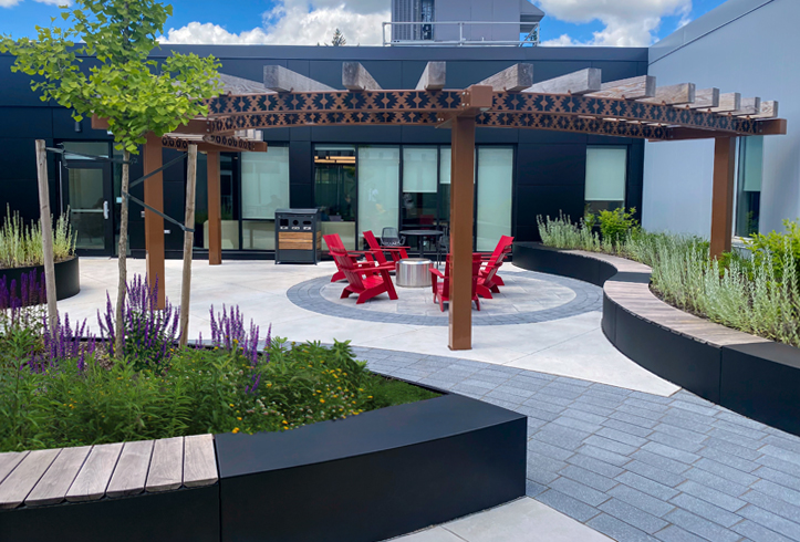 Green Theory Join Modular Planter Systems in a courtyard at Conestoga College Guelph campus.